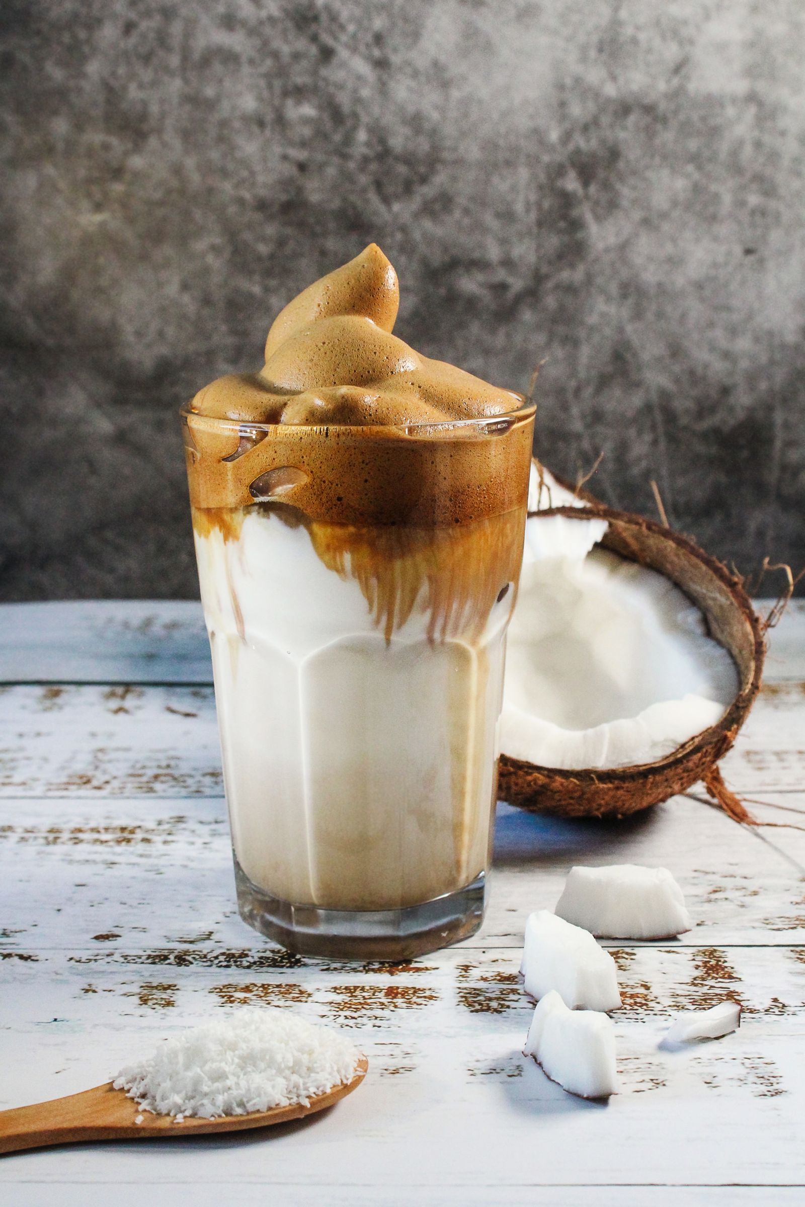 Creamy coconut coffee drink with coconut pieces